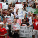 Demonstrators protest against policies of the Detroit Water and Sewerage Department on July 18, 2014, in Detroit. The utility has cut off water to thousands of city residents who are behind on their bills.
Joshua Lott/Getty Images